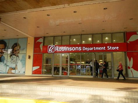 Currency exchange near Robinson mall in Manila .